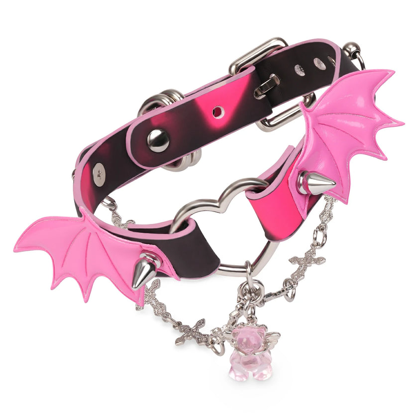 QIYE_Leather_Sweetheart_Devil_Collar_Choker: A fashionable choker featuring a black and pink gradient leather strap, metallic hardware, pink bat - wing accents with spikes, a silver chain, and a pink crystal charm.
