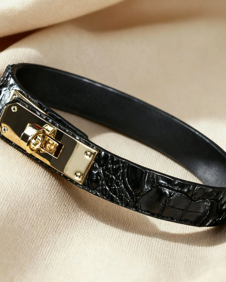 High-gloss black crocodile embossed leather choker with a polished gold-tone turn-lock metal buckle
