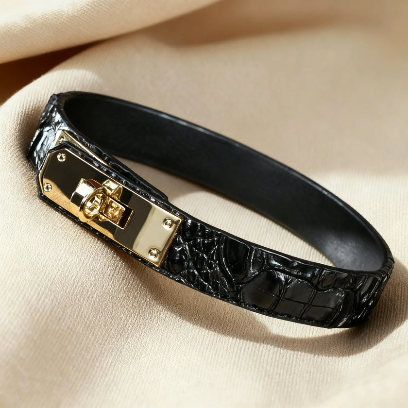 High-gloss black crocodile embossed leather choker with a polished gold-tone turn-lock metal buckle