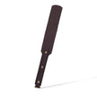 QIYE_Leather_Blaming_Words_Paddle_Heat_Reactive: Handmade BDSM paddle. Made of heat - reactive leather with color - changing ability, showcasing artisanal design for kink play, presented in pre - color - change state. 