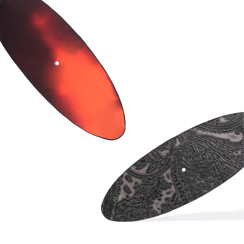 QIYE_Leather_Eye_Clamp_Rhythm_Paddle_Heat_Reactive: Handmade BDSM glasses clip. Serves as wearable necklace, crafted with heat - reactive, color - changing leather. Displays temperature - induced color shift and embossed patterns, blending artisanal kink - play design. 