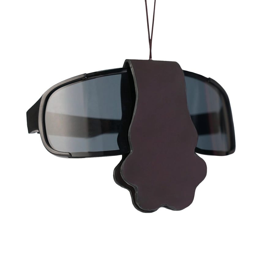 QIYE_Leather_Eye_Clamp_Rhythm_Paddle_Heat_Reactive: Handmade BDSM glasses clip. Doubles as wearable necklace, made of heat - reactive, color - changing leather, blending artisanal kink - play style, shown clipped on glasses.