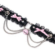 QIYE_Leather_Lilith_Collar_Choker_Heat_Reactive: A heat - reactive choker laid flat, featuring black lace, pink bows, metallic chains, and a pink bell. 