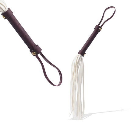「Luminous Whip」Handmade Leather BDSM Flogger: Handmade BDSM flogger featuring glow - in - the - dark, heat - reactive, color - changing faux leather tails. Delivers soft - to - stinging impact, blending ethereal luminous charm with responsive design for kink scenes.