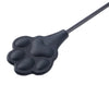 「Dog Paw」Handmade Color - changing Leather Paddle: Handmade BDSM dog paddle. Made of heat - reactive, color - changing leather. Features cute dog - paw impact surface, blending artisanal kink - play style with touch - responsive color shift, shown in paddle head close - up.
