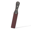 QIYE_Leathers_Heat_Reactive_Paddles_Bark_Eyes_Blackish_Red: Handmade BDSM leather carving spanking paddle with color - changing potential. Features a blackish - red hue before activation, adorned with customizable leather - carved patterns on the handle, showcasing artisanal design for kink play.