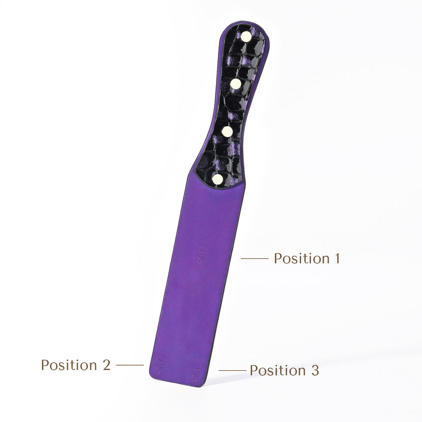 Qiye_Bark_Eyes_Violet_Paddle_original_embossing_custom: Handmade BDSM leather spanking paddle with color - changing trait. Highlights 3 customizable stamping positions for leather carving patterns, enabling personalized artisanal design for kink play.